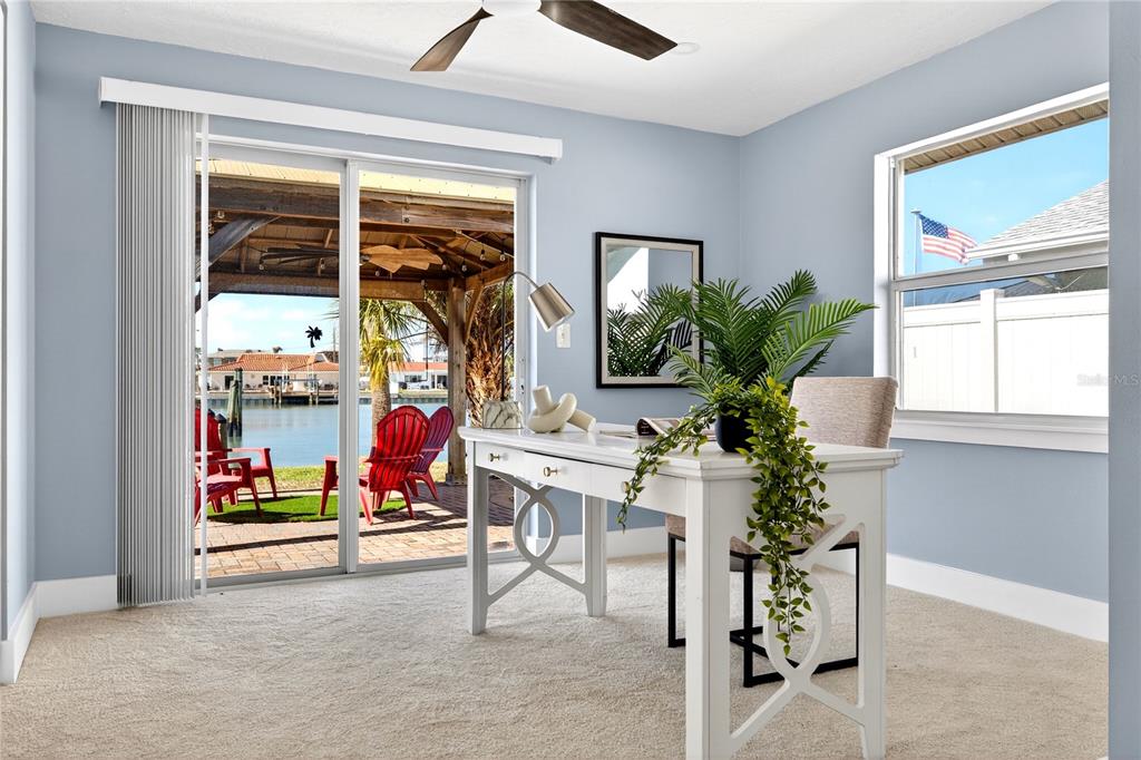 6410 3rd Palm Point St. Pete Beach, FL 33706 - Photo 19 of 71 a living room filled with furniture