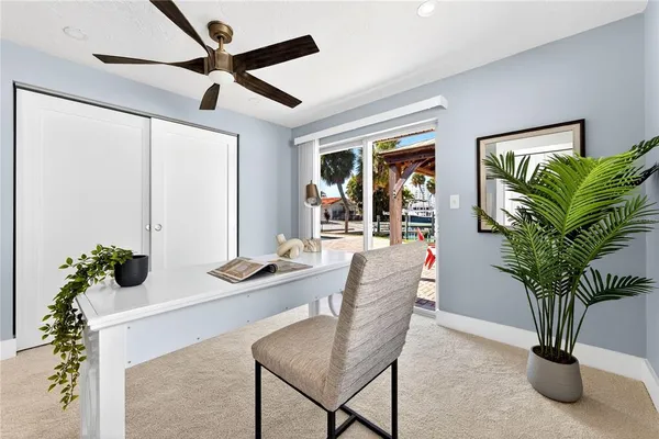 a bathroom with a sink vanity and a mirror