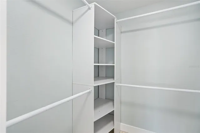 a bathroom with a shower and toilet