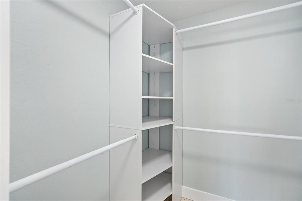 6410 3rd Palm Point St. Pete Beach, FL 33706 - Photo 31 of 54 a view of an empty walk in closet