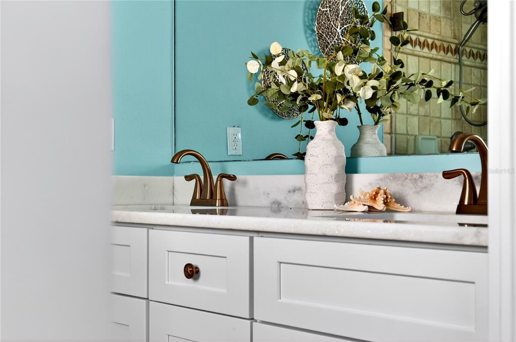 6410 3rd Palm Point St. Pete Beach, FL 33706 - Photo 64 of 71 a close view of sink with granite countertop