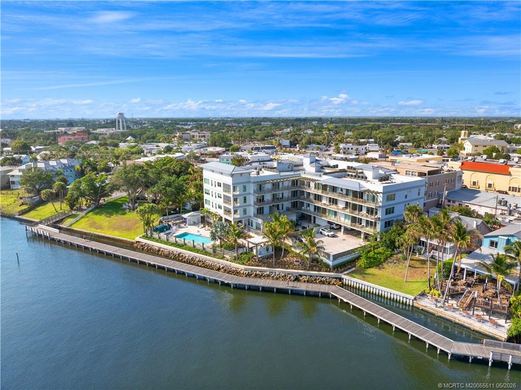 41 Southwest Seminole Street, Unit 208 Stuart, FL 34994 - Photo 46 of 46 a view of a city with swimming pool