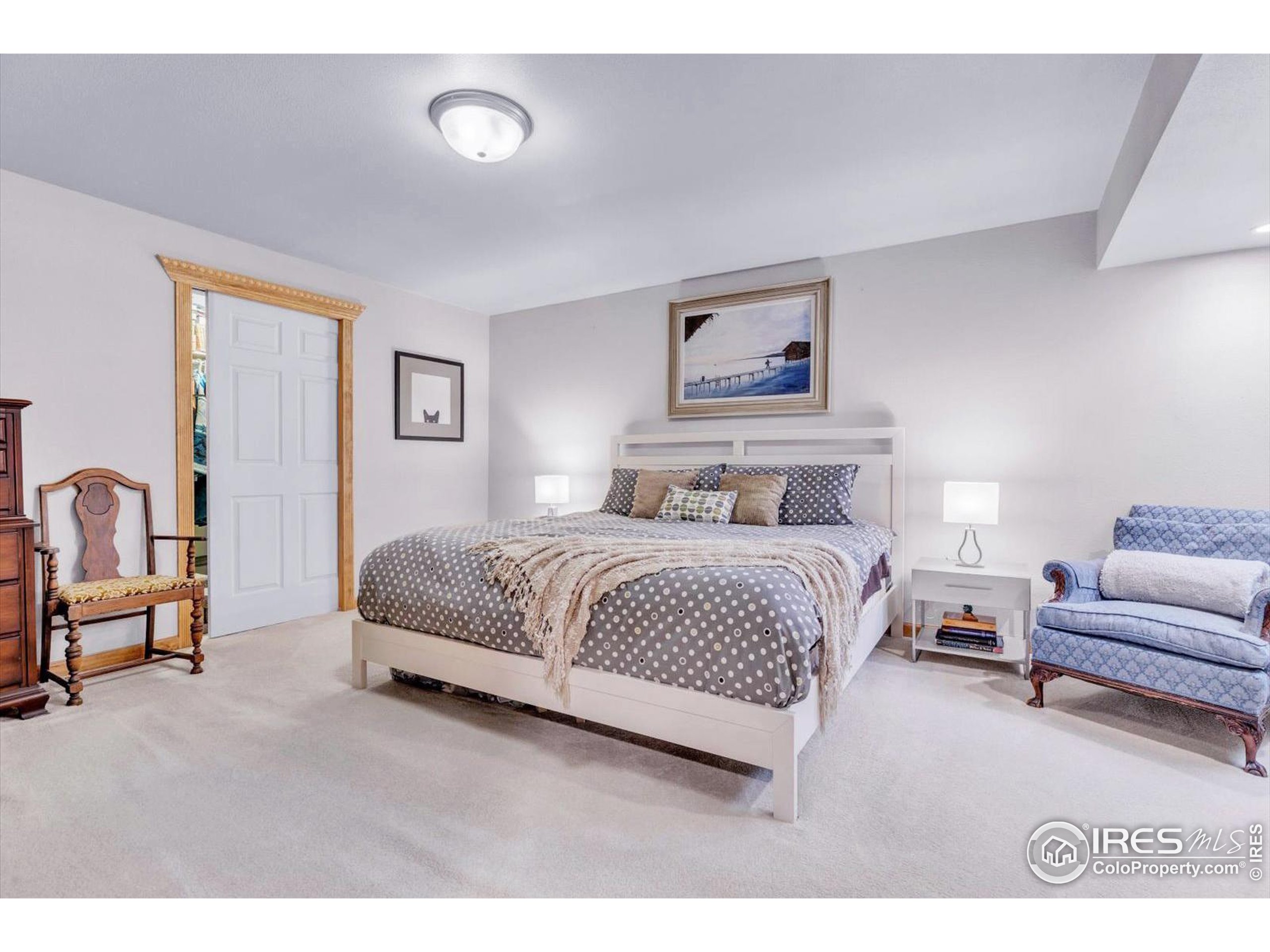 147 Keystone Trail Broomfield, CO 80020 - Photo 14 of 20 a bedroom with a bed a couch and a view of bedroom