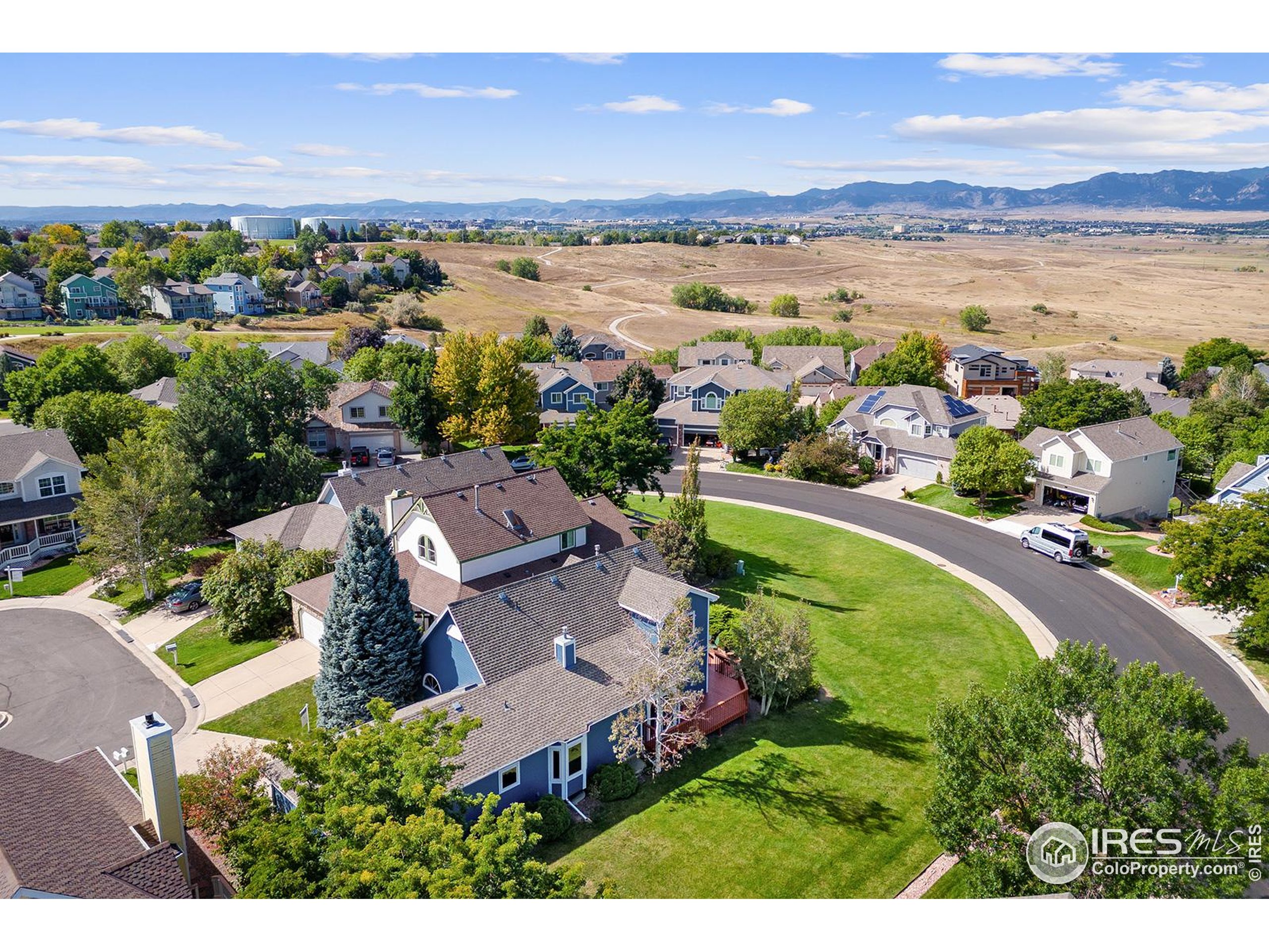 147 Keystone Trail Broomfield, CO 80020 - Photo 2 of 20 an aerial view of residential houses with outdoor space and ocean view