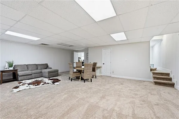 a living room with furniture and a couch