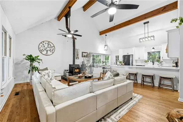 a living room with furniture and a table