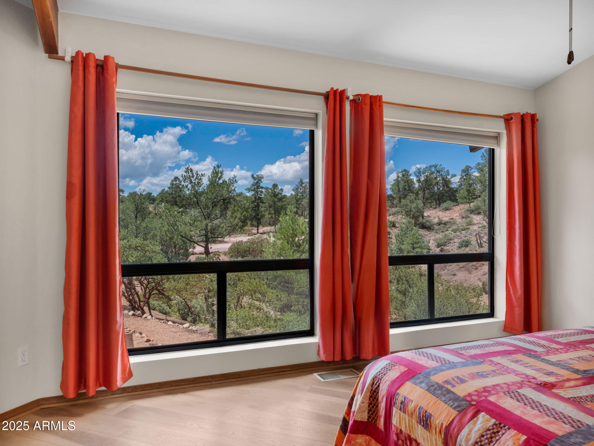 1111 South Sutton Road Payson, AZ 85541 - Photo 26 of 50 a view of a bedroom with a large window and bed
