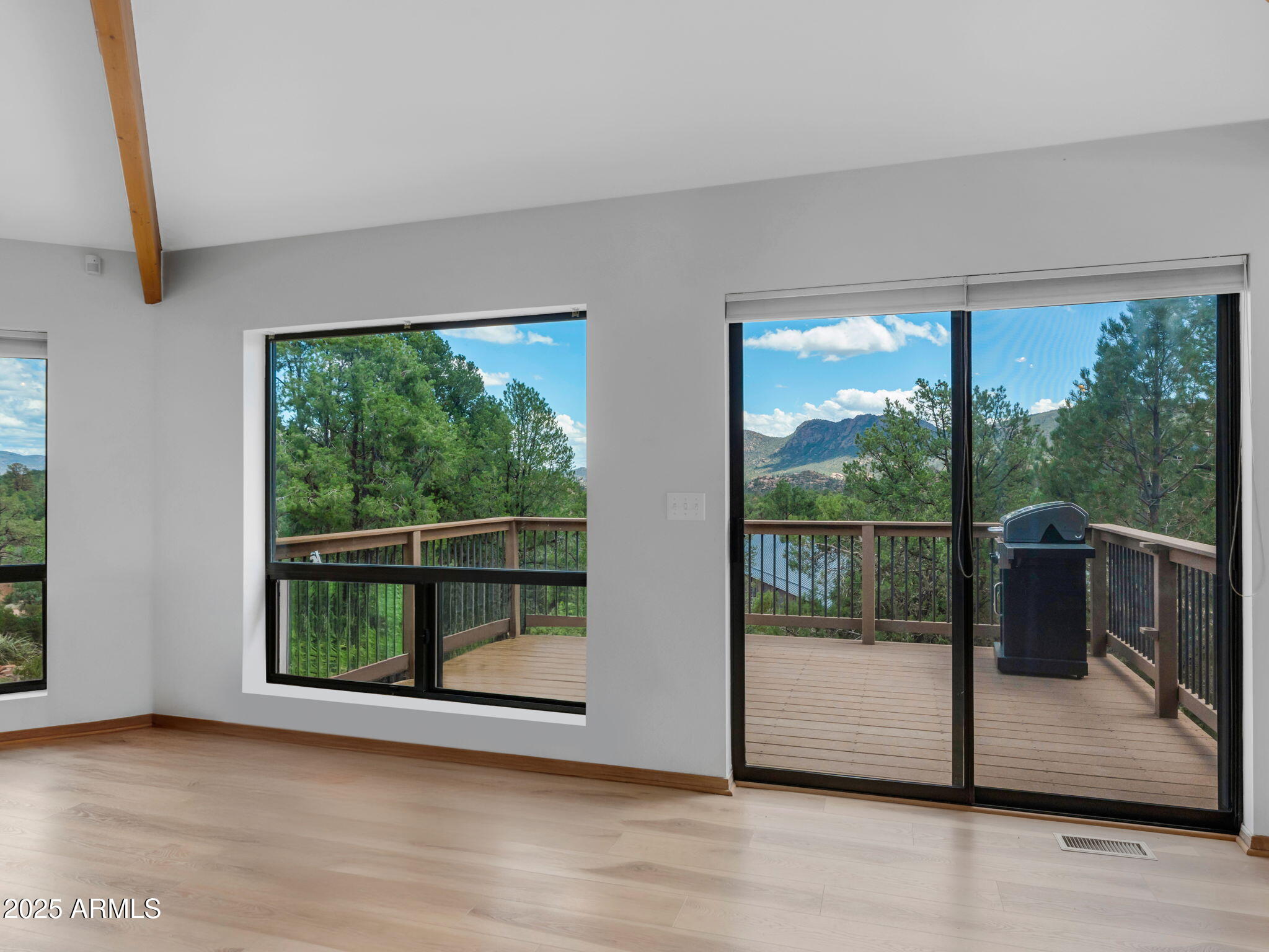 1111 South Sutton Road Payson, AZ 85541 - Photo 9 of 50 a view of a room with wooden floor and windows