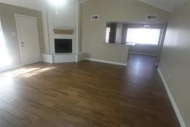 a view of an empty room and window