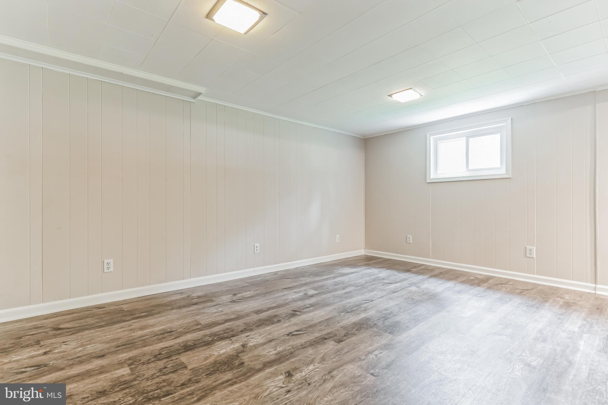 6809 Dodge Lane Temple Hills, MD 20748 - Photo 27 of 47 Basement w/new LVP Flooring