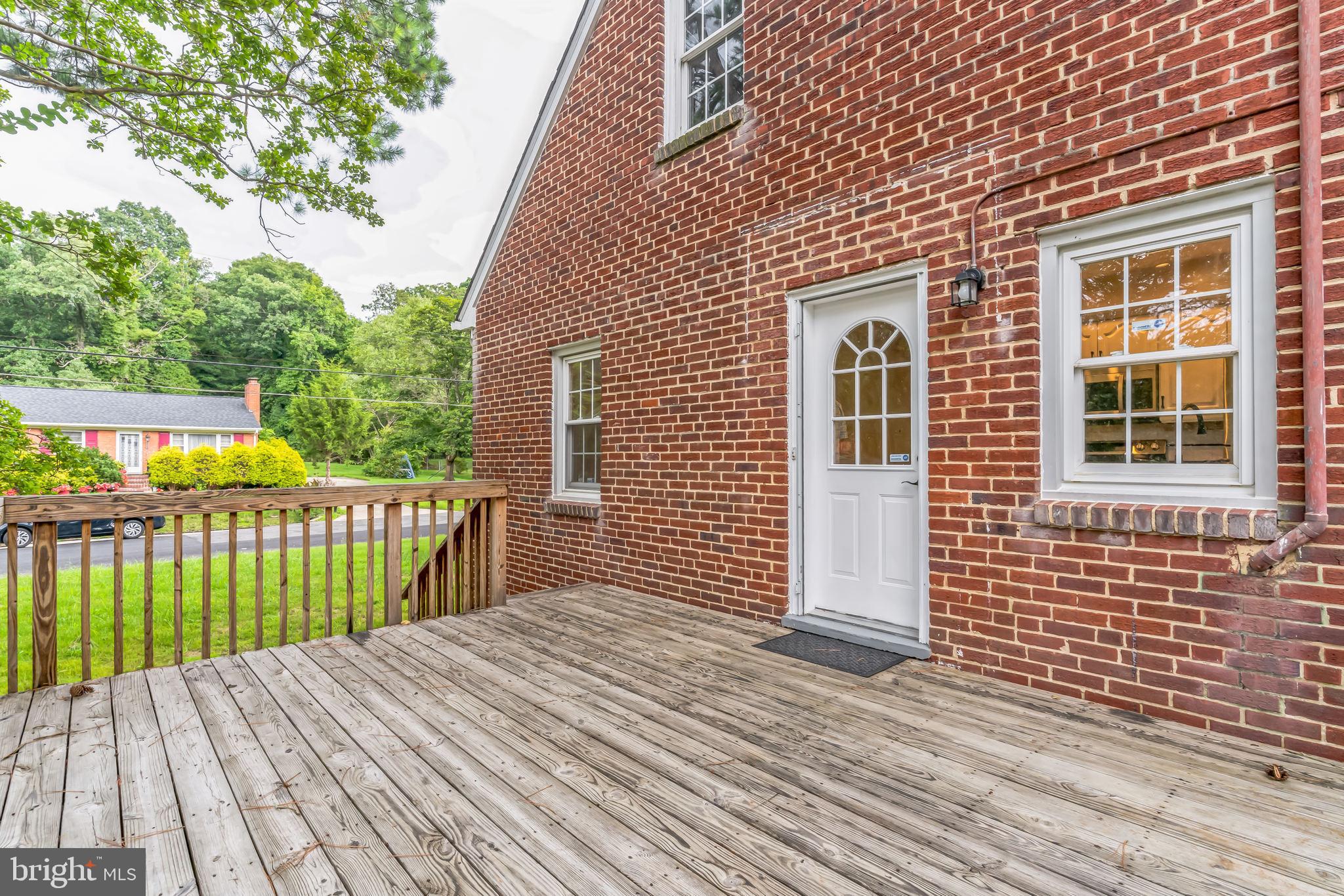 6809 Dodge Lane Temple Hills, MD 20748 - Photo 31 of 47 Deck overlooks the park-like backyard