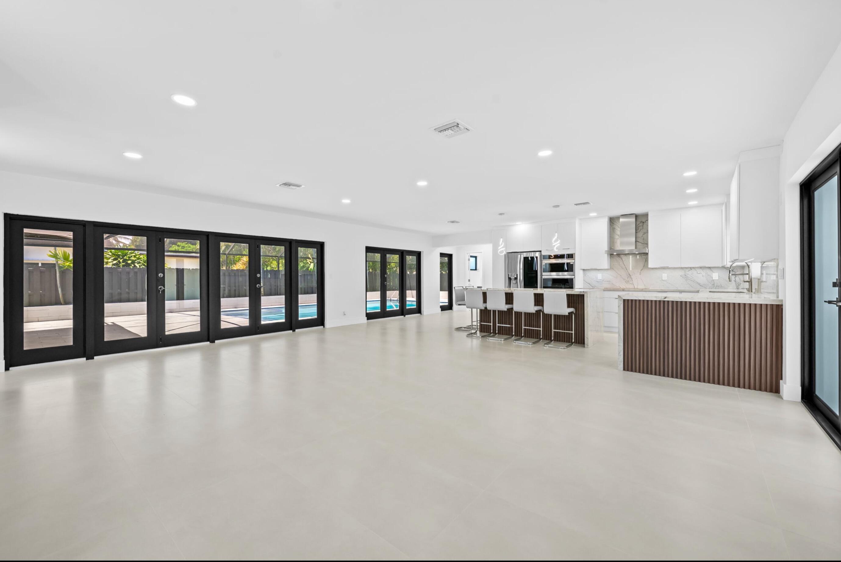 2811 Northeast 53rd Court Lighthouse Point, FL 33064 - Photo 9 of 31 Living dinning Room Long