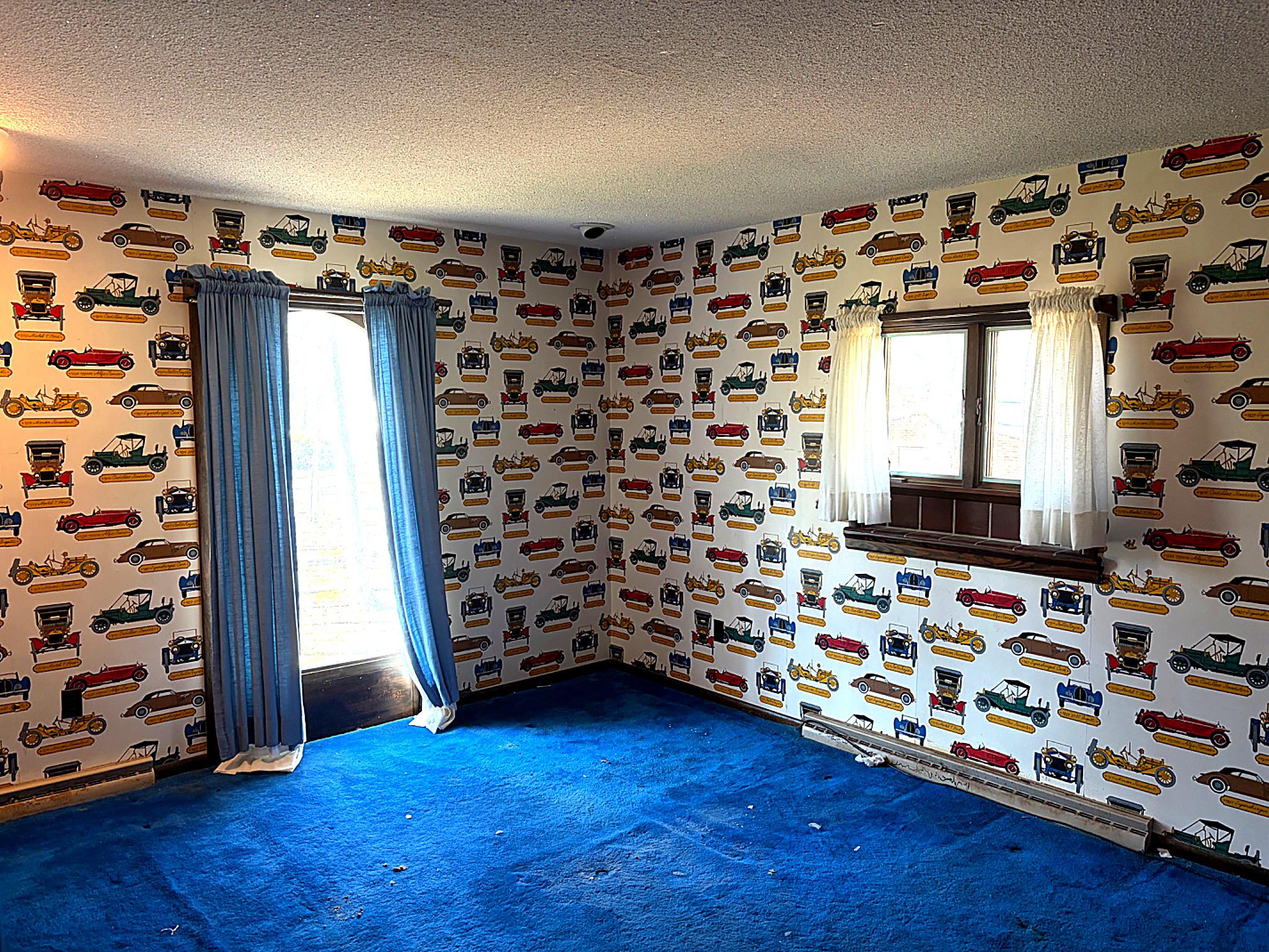 1590 East Elmer Road Vineland, NJ 08361 - Photo 17 of 25 a view of an empty room with wooden floor and windows