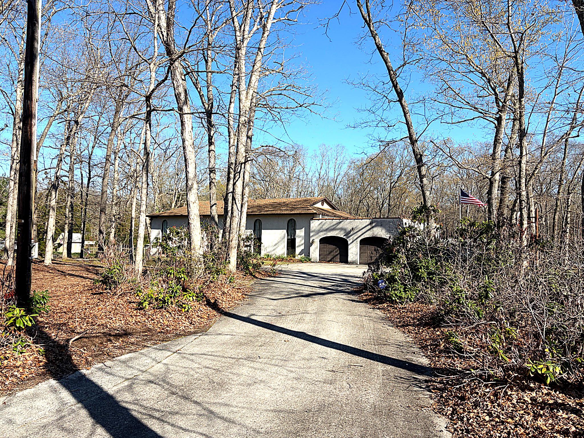 1590 East Elmer Road Vineland, NJ 08361 - Photo 2 of 25 a view of a house with a yard