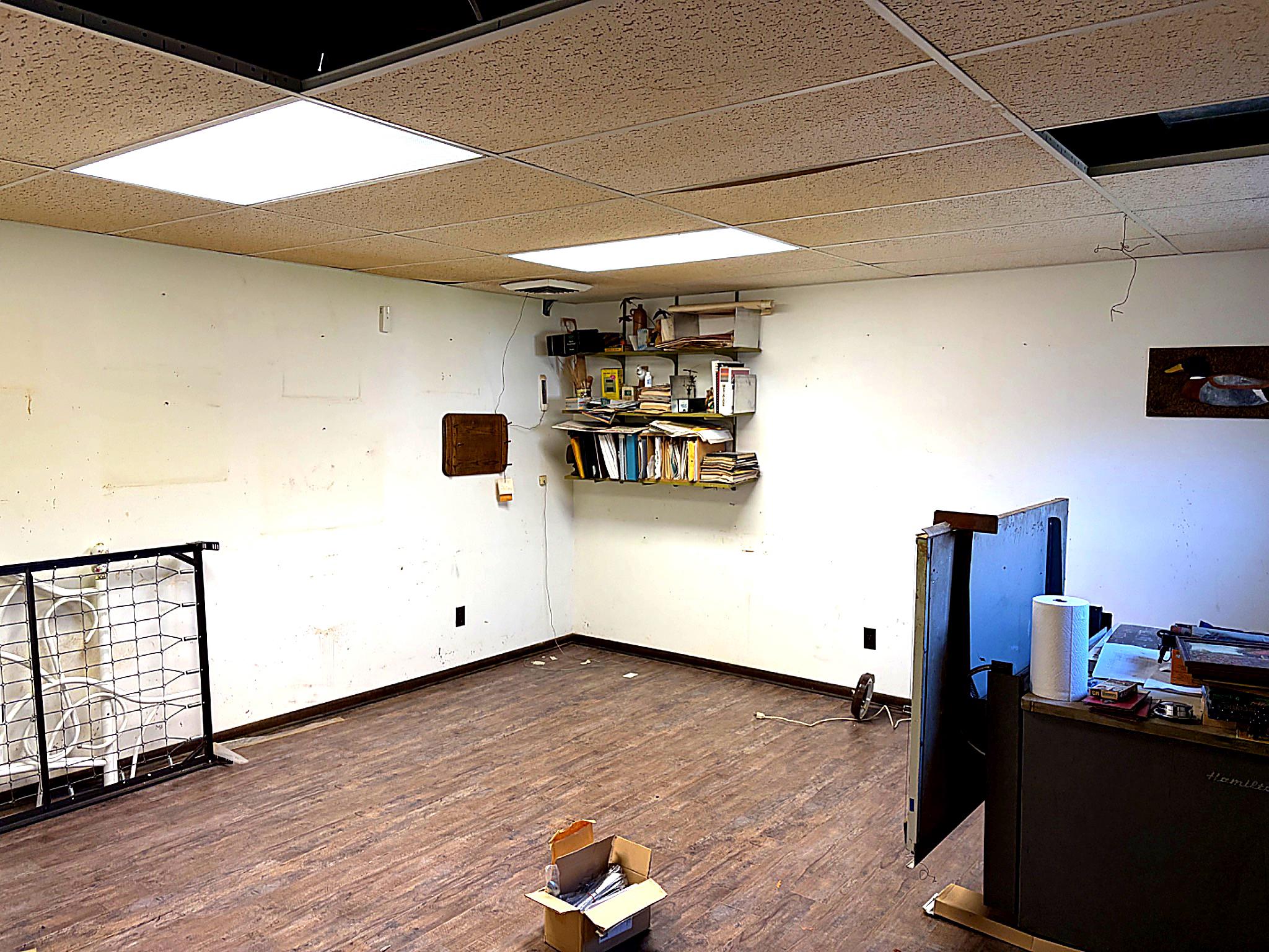 1590 East Elmer Road Vineland, NJ 08361 - Photo 21 of 25 a view of a workspace with wooden floor