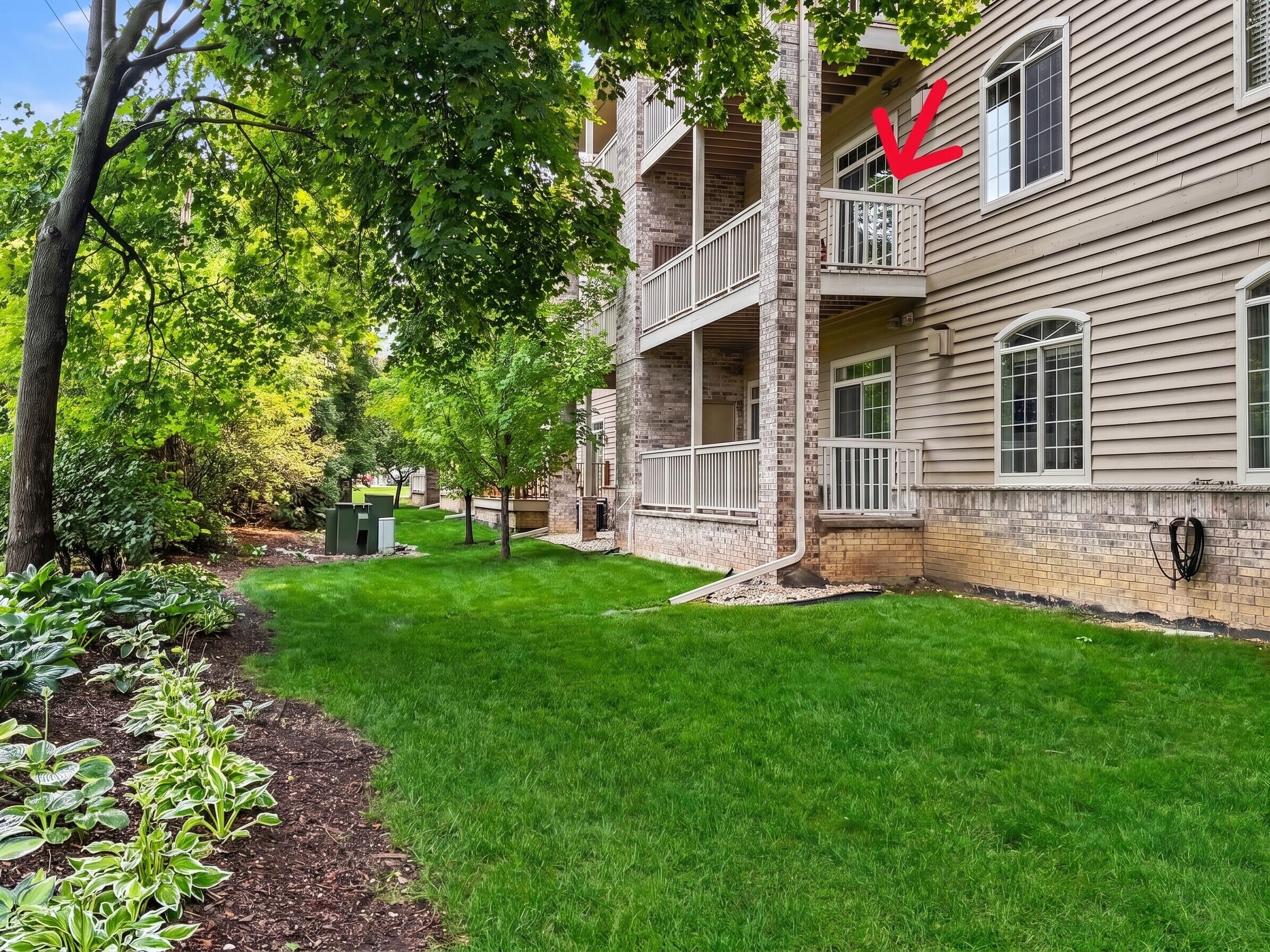 13050 West Bluemound Road, Unit 203 Elm Grove, WI 53122 - Photo 23 of 24 View of unit balcony from outside