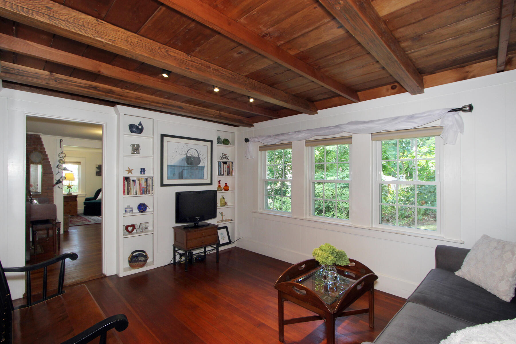 29 Pond Road Orleans, MA 02653 - Photo 17 of 41 a living room with furniture and a flat screen tv