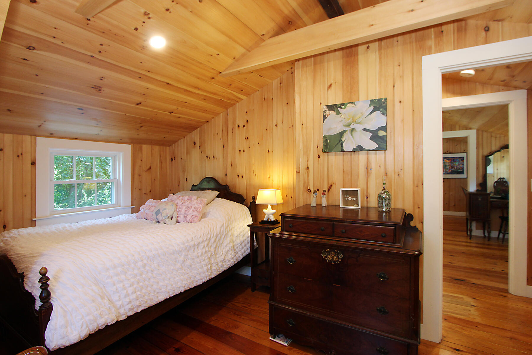 29 Pond Road Orleans, MA 02653 - Photo 21 of 41 a bedroom with a bed and a dresser