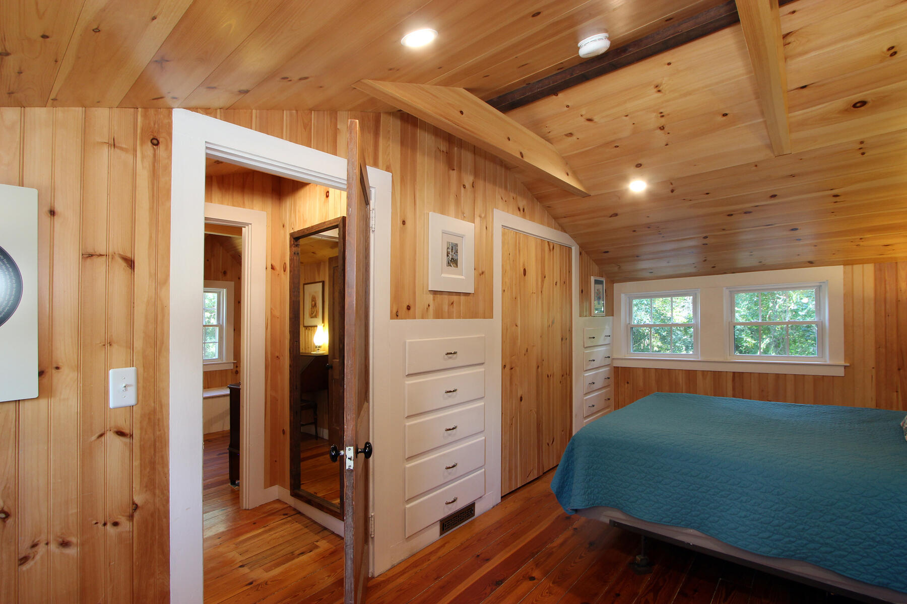 29 Pond Road Orleans, MA 02653 - Photo 24 of 41 a view of a hallway with closet and window