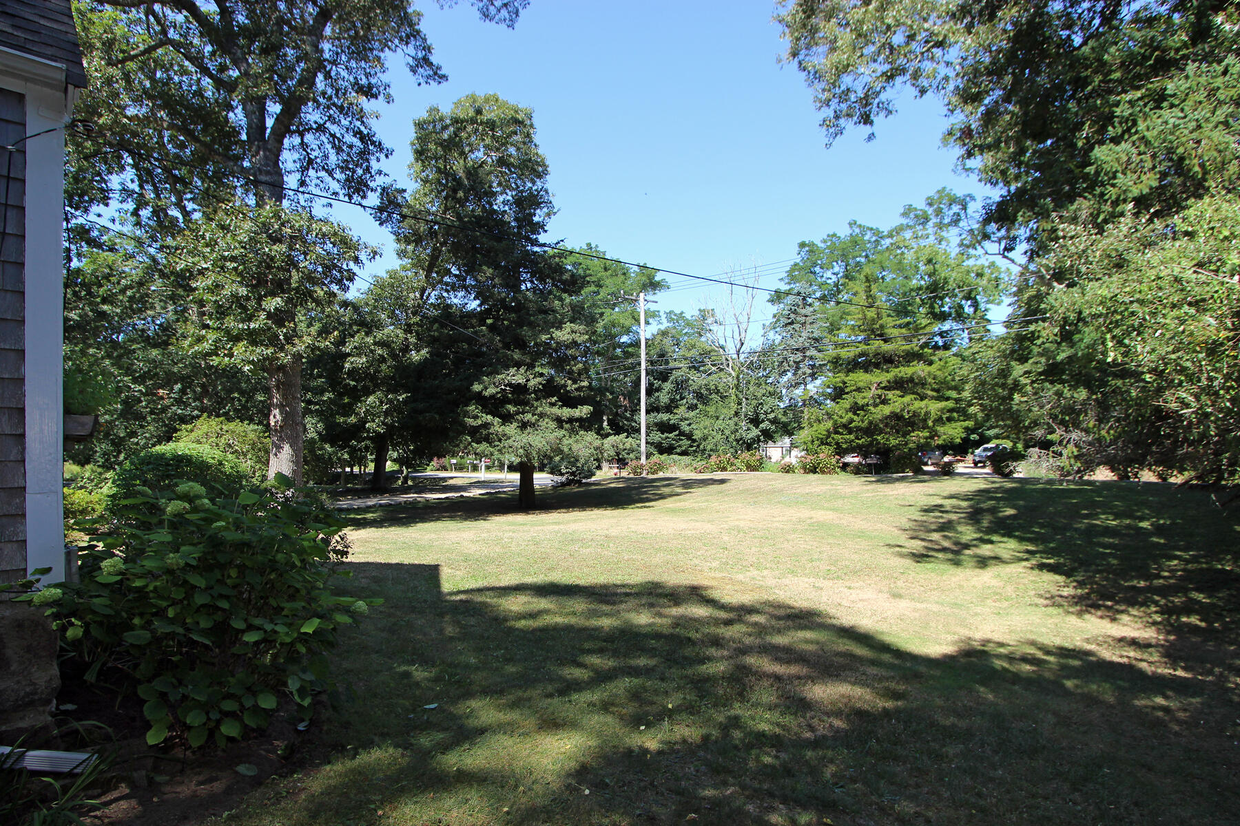 29 Pond Road Orleans, MA 02653 - Photo 32 of 41 a view of a yard with a tree