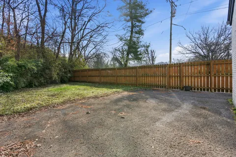 a view of backyard with green space