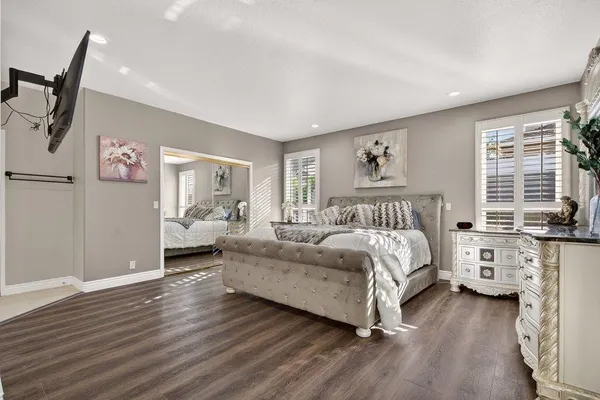 a bed room with a bed and a couch