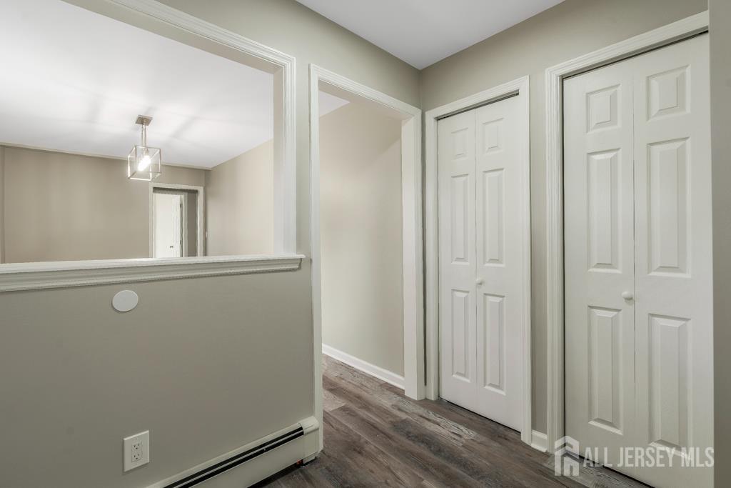 120 Chestnut Street Bridgewater, NJ 08807 - Photo 12 of 32 an entryway with wooden floor and cabinet