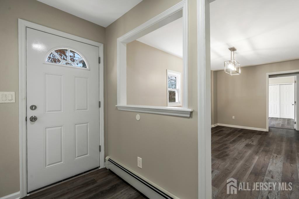 120 Chestnut Street Bridgewater, NJ 08807 - Photo 13 of 32 a view of an entryway with wooden floor