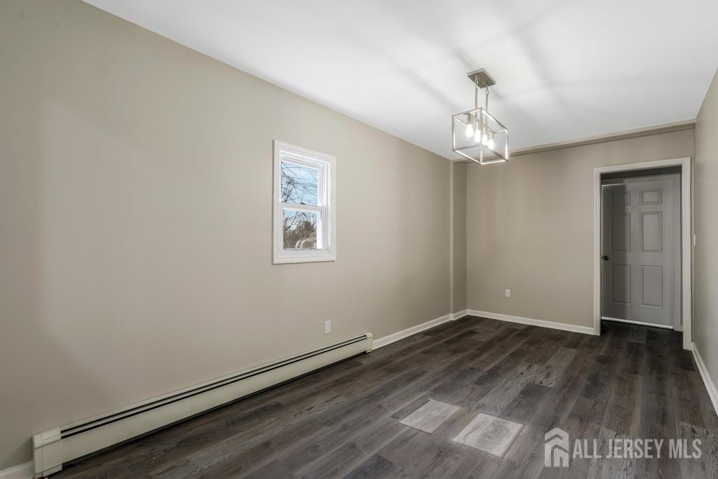 120 Chestnut Street Bridgewater, NJ 08807 - Photo 14 of 32 wooden floor in an empty room with a window