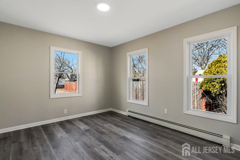 120 Chestnut Street Bridgewater, NJ 08807 - Photo 18 of 32 wooden floor in an empty room with a window