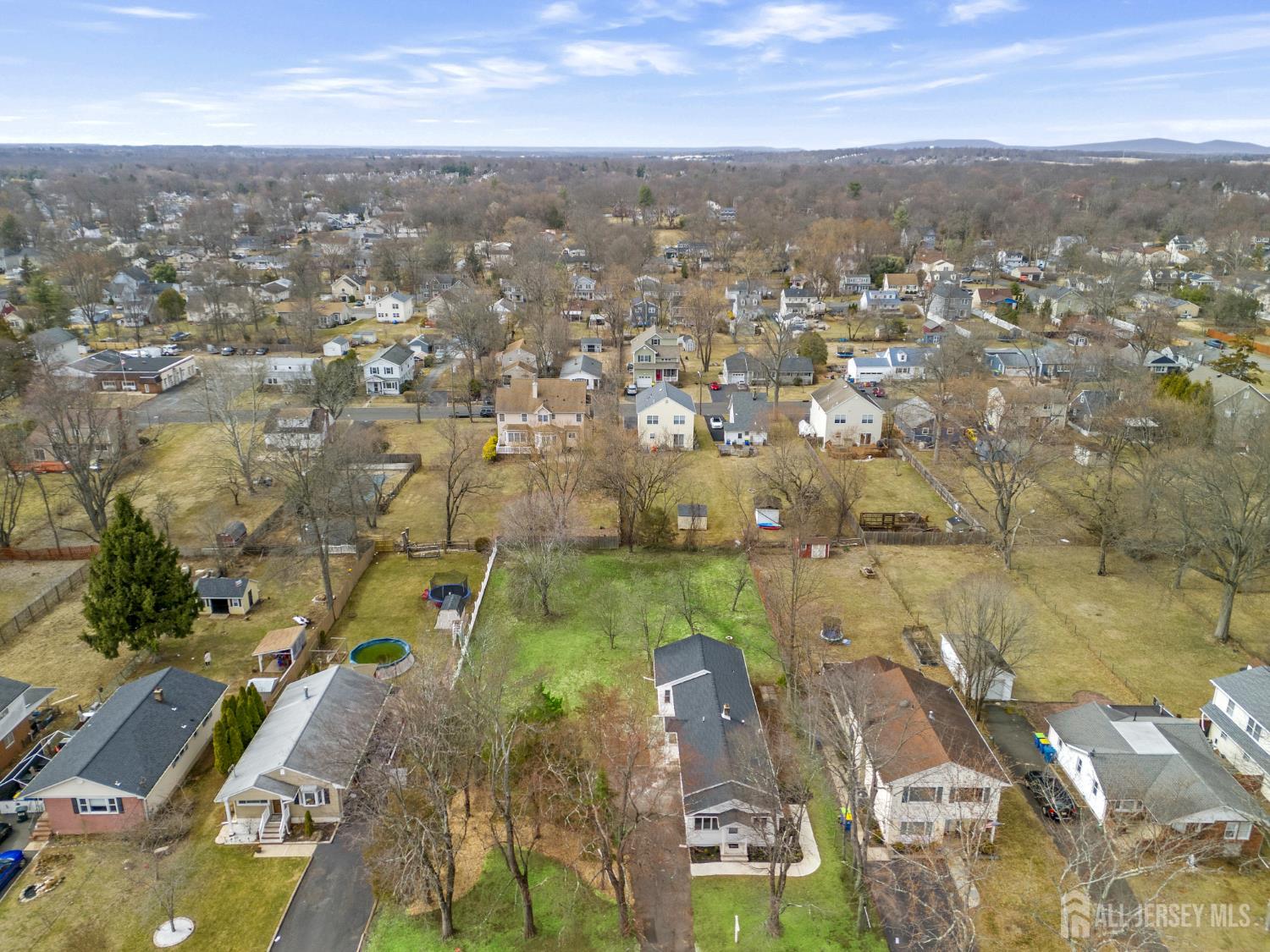 120 Chestnut Street Bridgewater, NJ 08807 - Photo 2 of 32 an aerial view of residential houses with outdoor space