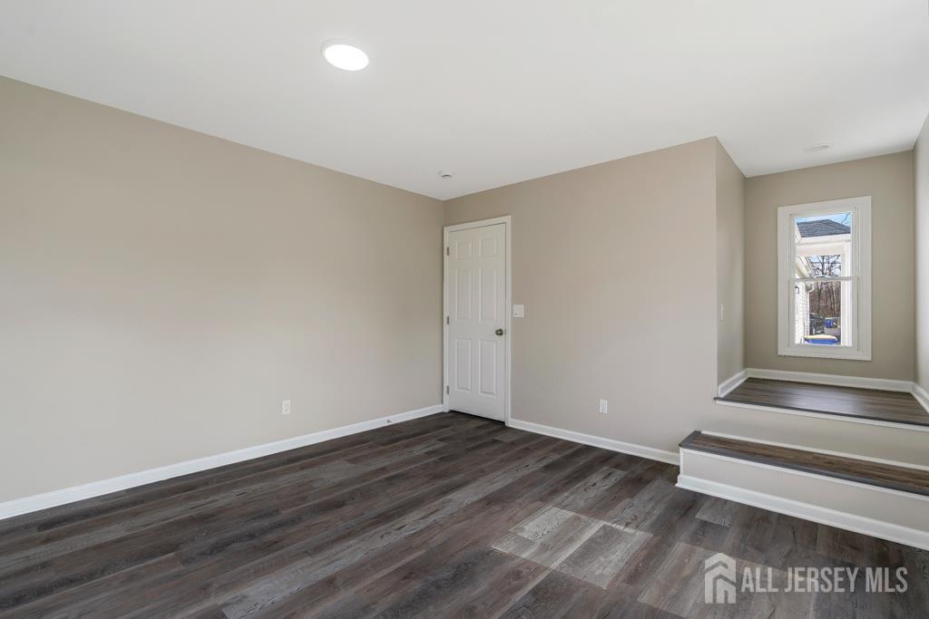 120 Chestnut Street Bridgewater, NJ 08807 - Photo 21 of 32 a view of wooden floor and windows in a room