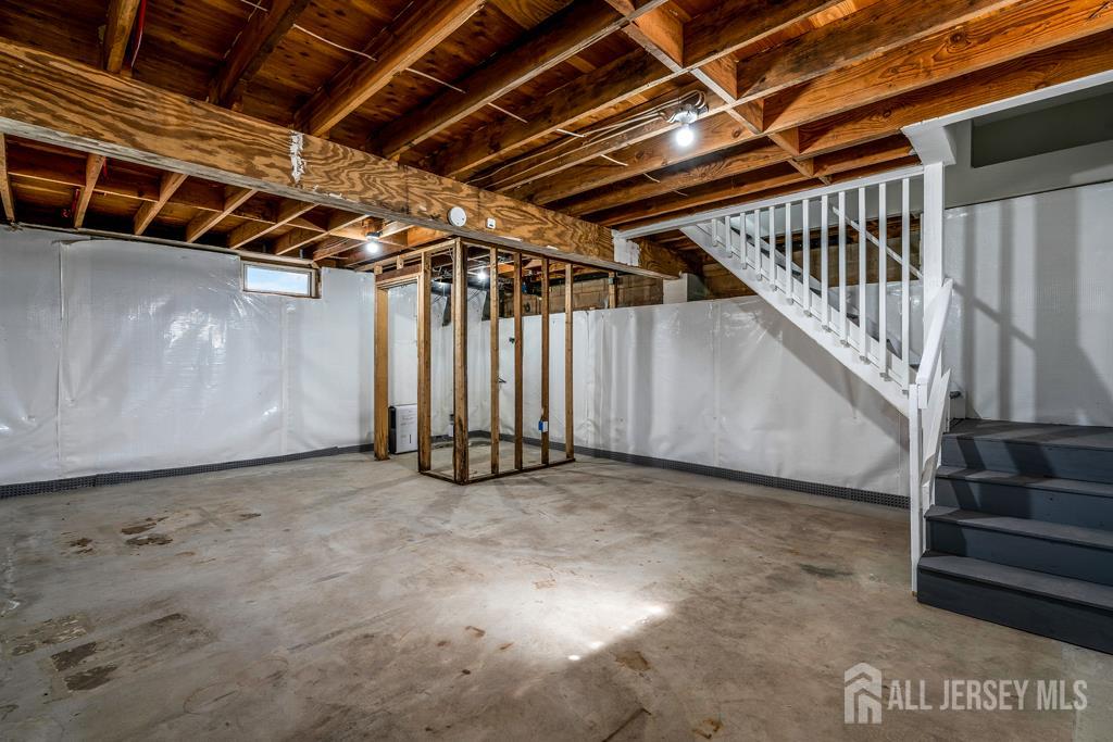 120 Chestnut Street Bridgewater, NJ 08807 - Photo 23 of 32 a view of an empty room with stairs