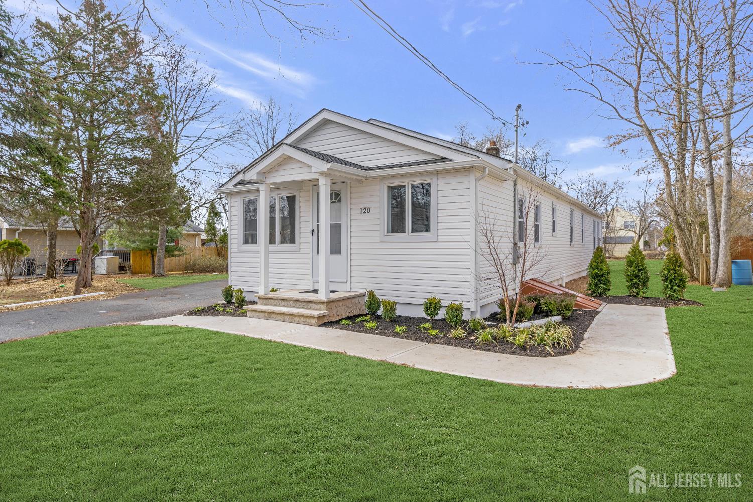 120 Chestnut Street Bridgewater, NJ 08807 - Photo 27 of 32 a front view of a house with a garden