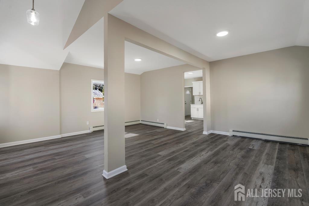 120 Chestnut Street Bridgewater, NJ 08807 - Photo 6 of 32 a view of an empty room with wooden floor