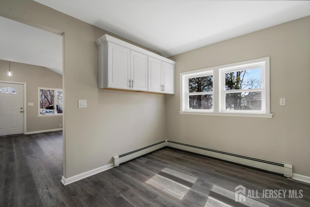 120 Chestnut Street Bridgewater, NJ 08807 - Photo 8 of 32 a view of a room with wooden floor and white walls