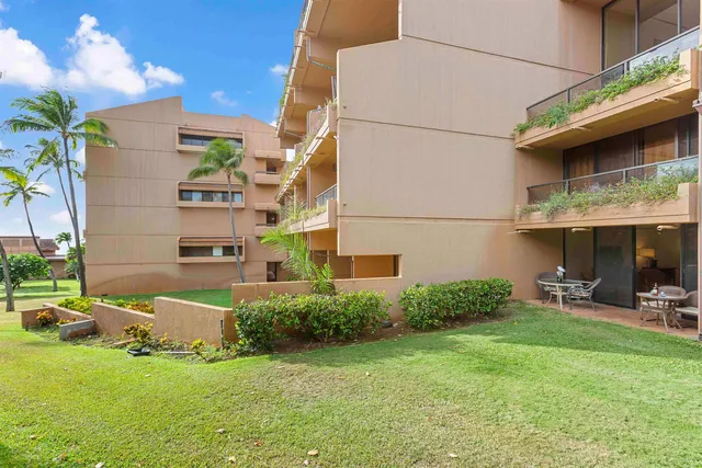 a view of swimming pool with outdoor seating