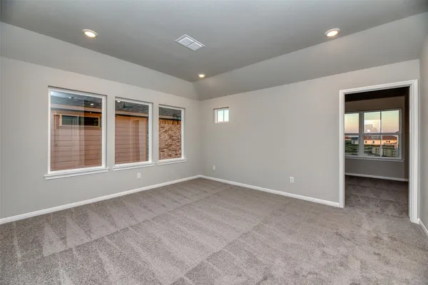 an empty room with windows