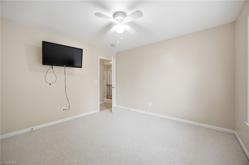 3659 Canopy Oak Court High Point, NC 27265 - Photo 27 of 42 Another angle of the 3rd bedroom with ceiling fan.