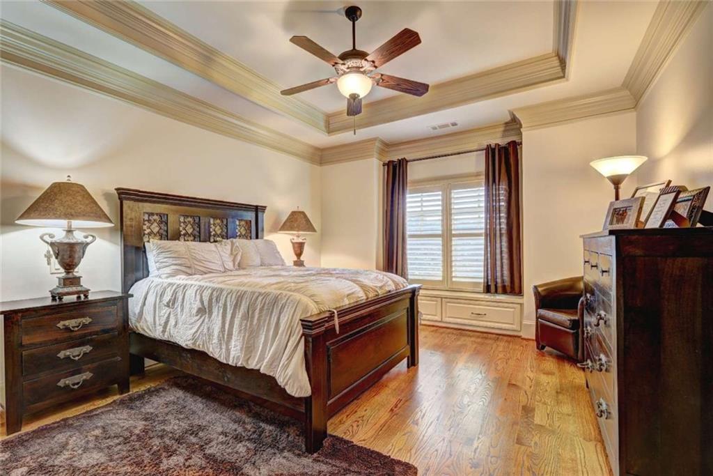 3027 Watsons Bend Milton, GA 30004 - Photo 20 of 39 a bedroom with a bed and wooden floor