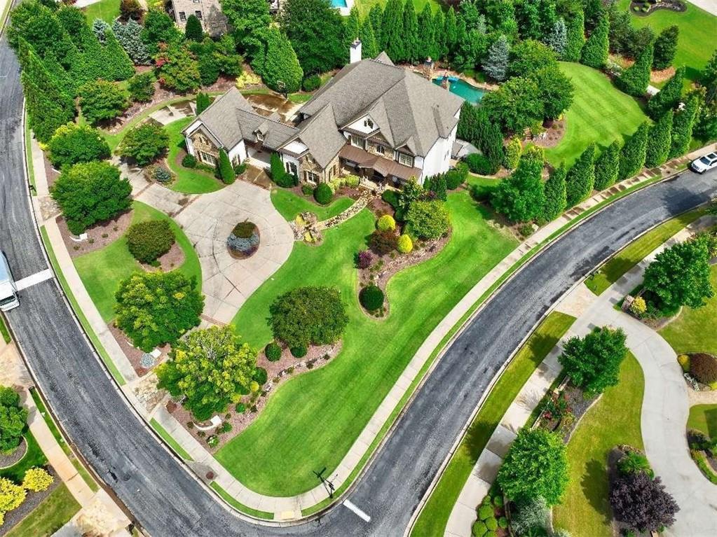3027 Watsons Bend Milton, GA 30004 - Photo 2 of 39 an aerial view of a residential houses with a yard and street