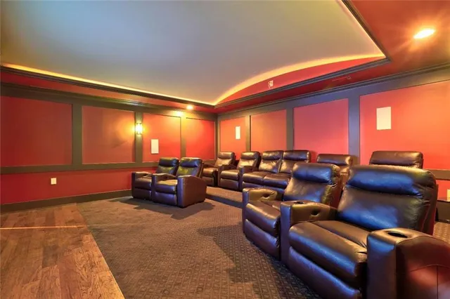 a living room with furniture and a lamp