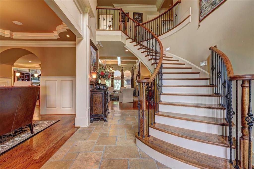 3027 Watsons Bend Milton, GA 30004 - Photo 3 of 39 a view of entryway and hall with wooden floor
