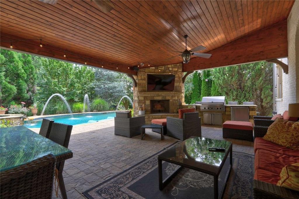 3027 Watsons Bend Milton, GA 30004 - Photo 31 of 39 a view of a patio filled with furniture