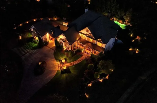 a sunset view with swimming pool