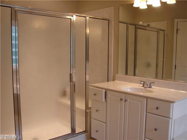 256 Old March Road Advance, NC 27006 - Photo 14 of 15 Master Bath/Spa. Large walk in shower with seat.