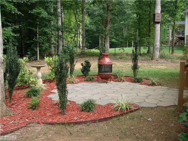 256 Old March Road Advance, NC 27006 - Photo 5 of 15 Yard/Garden. Enjoy a nice fire on a relaxing evening under the stars.
