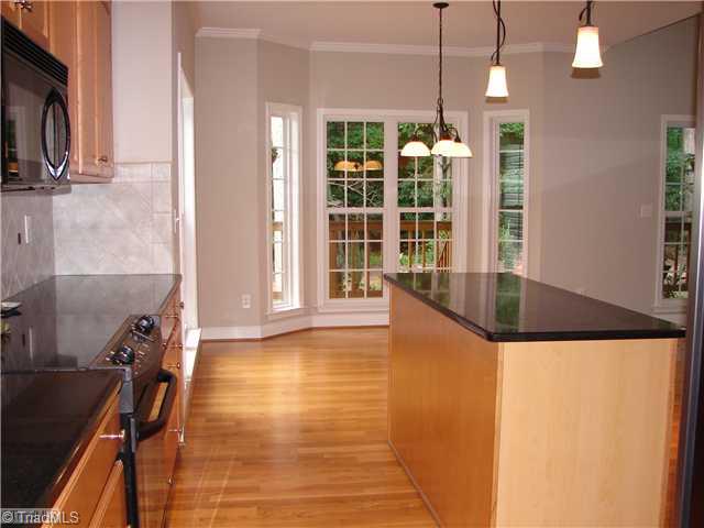 256 Old March Road Advance, NC 27006 - Photo 6 of 15 Kitchen. Very nice cabinetry and counter tops in this large kitchen.