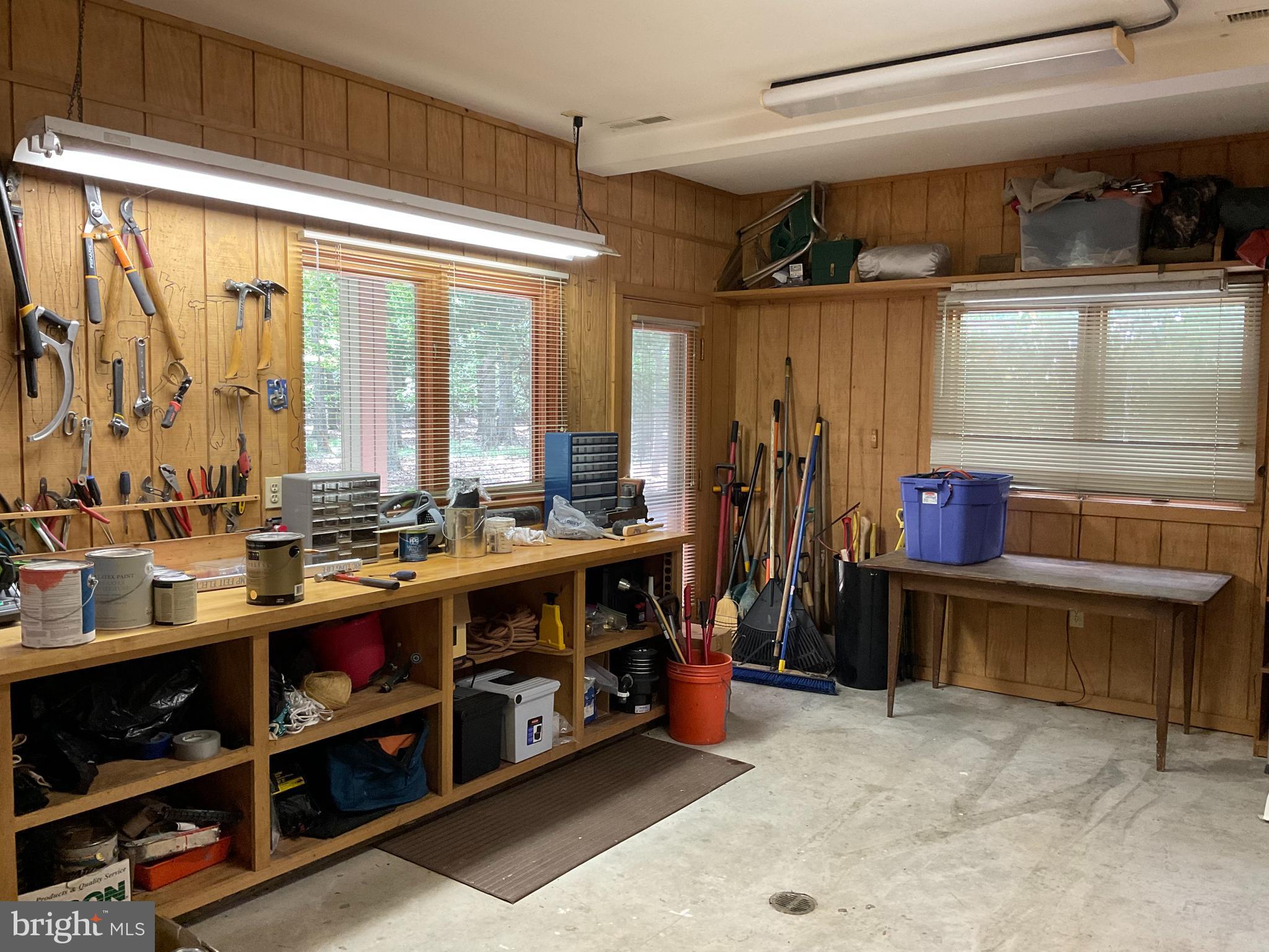 24283 Deep Neck Road Royal Oak, MD 21662 - Photo 54 of 59 Workshop attached to Garage and potting
