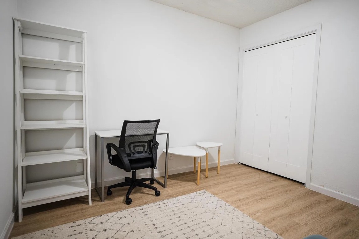 2600 Penny Lane, Unit 112 Austin, TX 78757 - Photo 13 of 20 a view of a workspace with furniture and a window